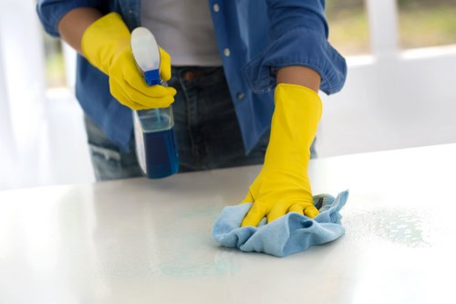 Cleaning carpets in a South Kensington office corridor and shared area
